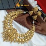 Gajalakshmi with 2 Layer Peacock Motiffs Short Neck Set