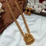 Lakshmi Maadam with Peacock Motiffs Long Neck Set