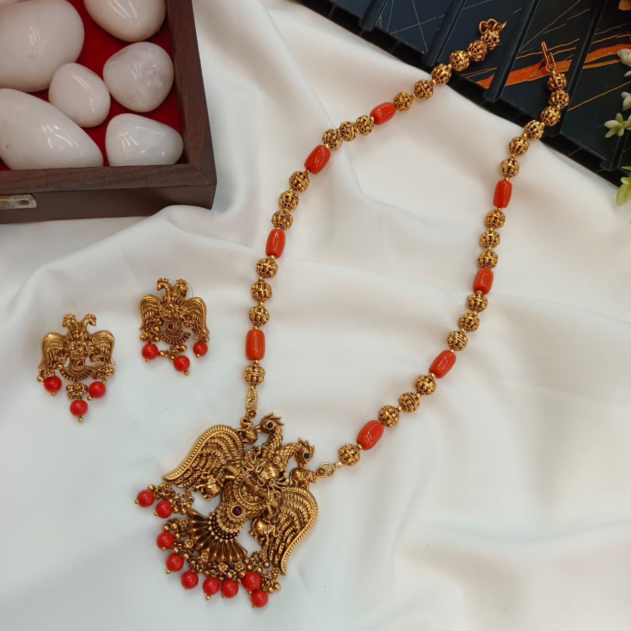104193.1.1Akshavi Trends (3) Gandaperuda Pendant with Amla and Coral Mala Short - Image 1