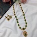 Jyothika's Emerald Long Neck Set