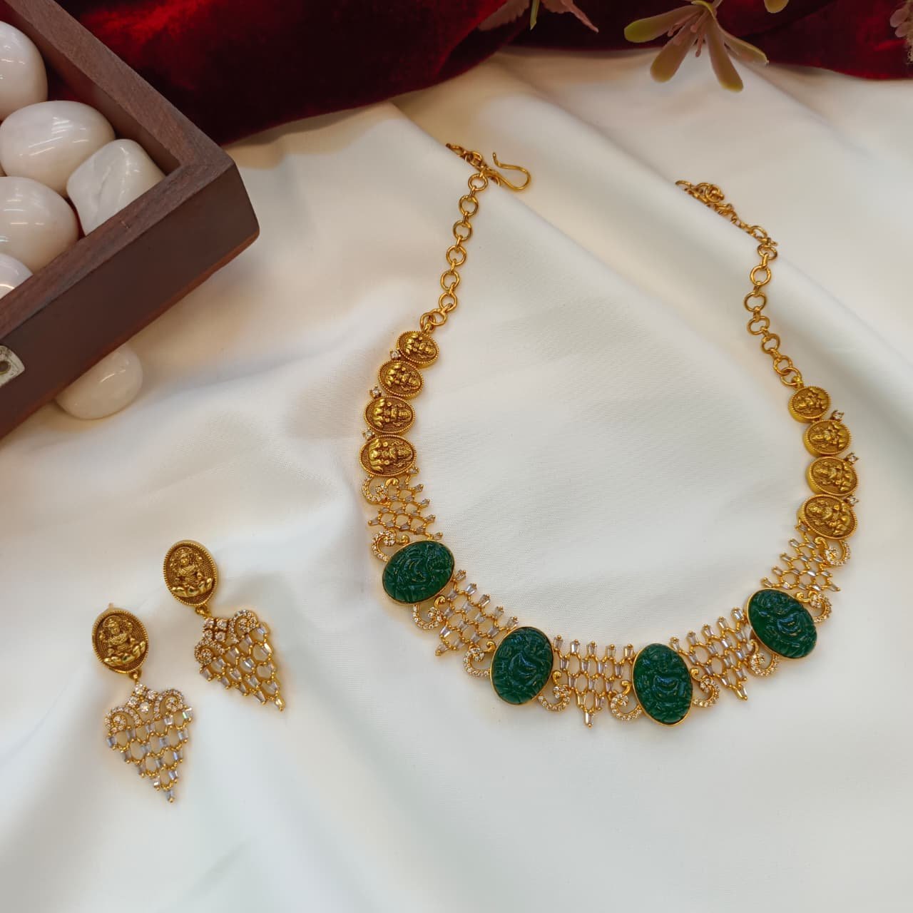 100658.1.1-Akshavi-Trends-Neck-Sets-2.jpeg Emerald Ganesha Lakshmi zircon Short Necke Set - Image 1