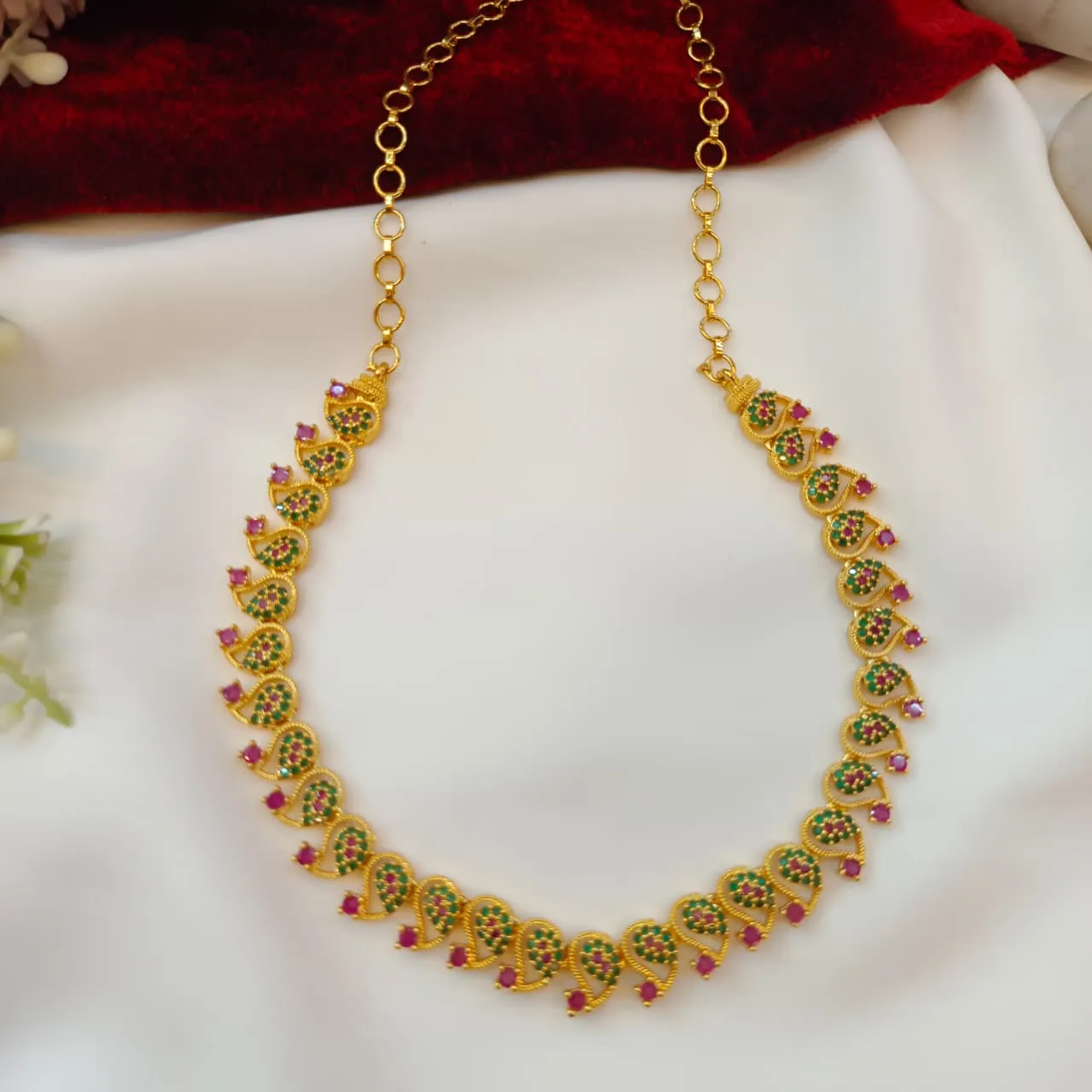 104425.1.1 Akshavi Trends Short Neck Set (1) AD Mango Short Necklace - Image 1